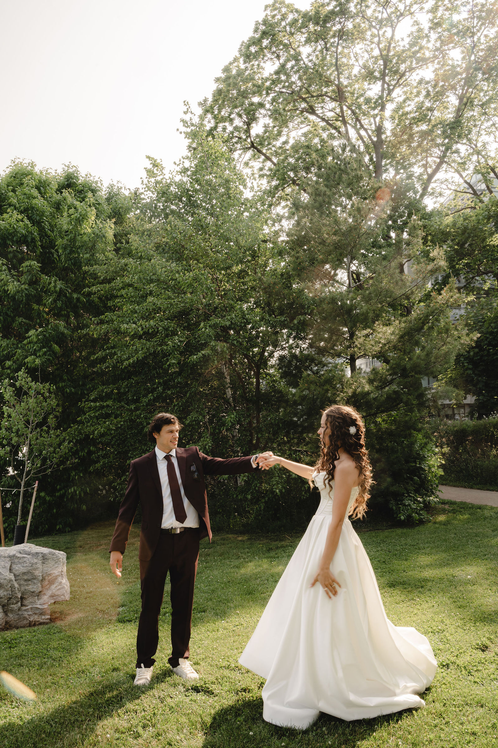 A twirl across the sunlit lawn