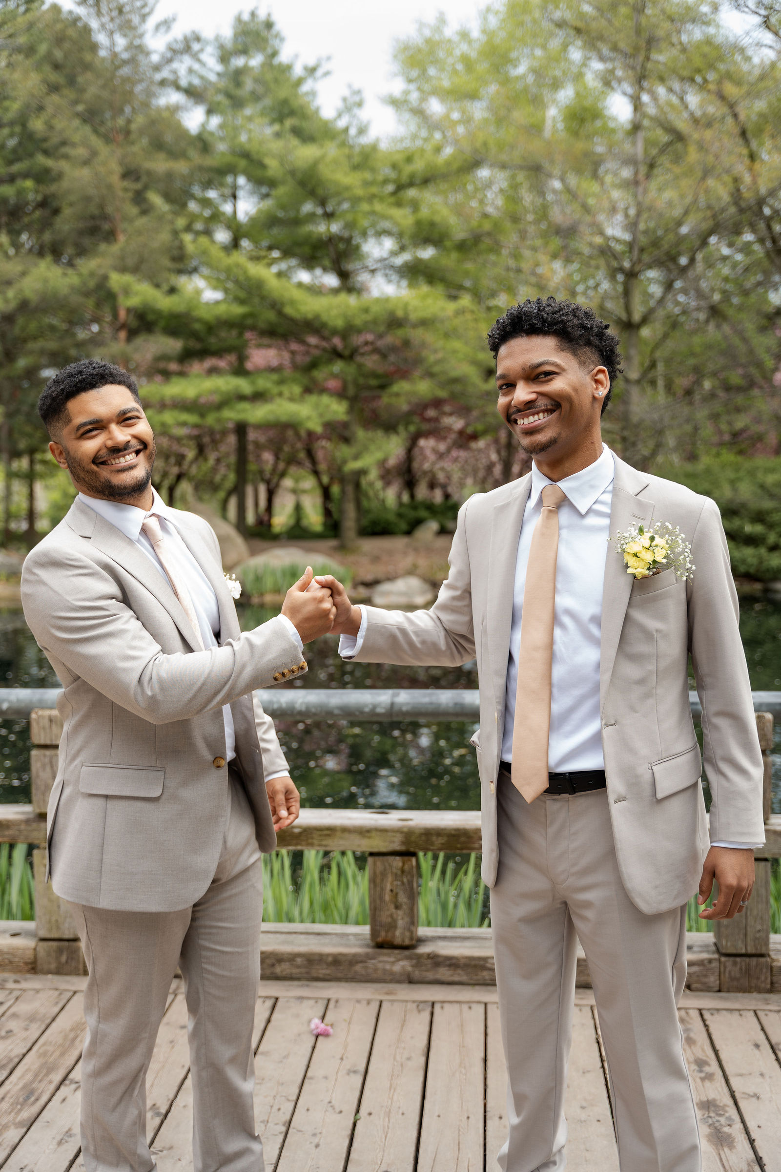 Groom and best man handshake
