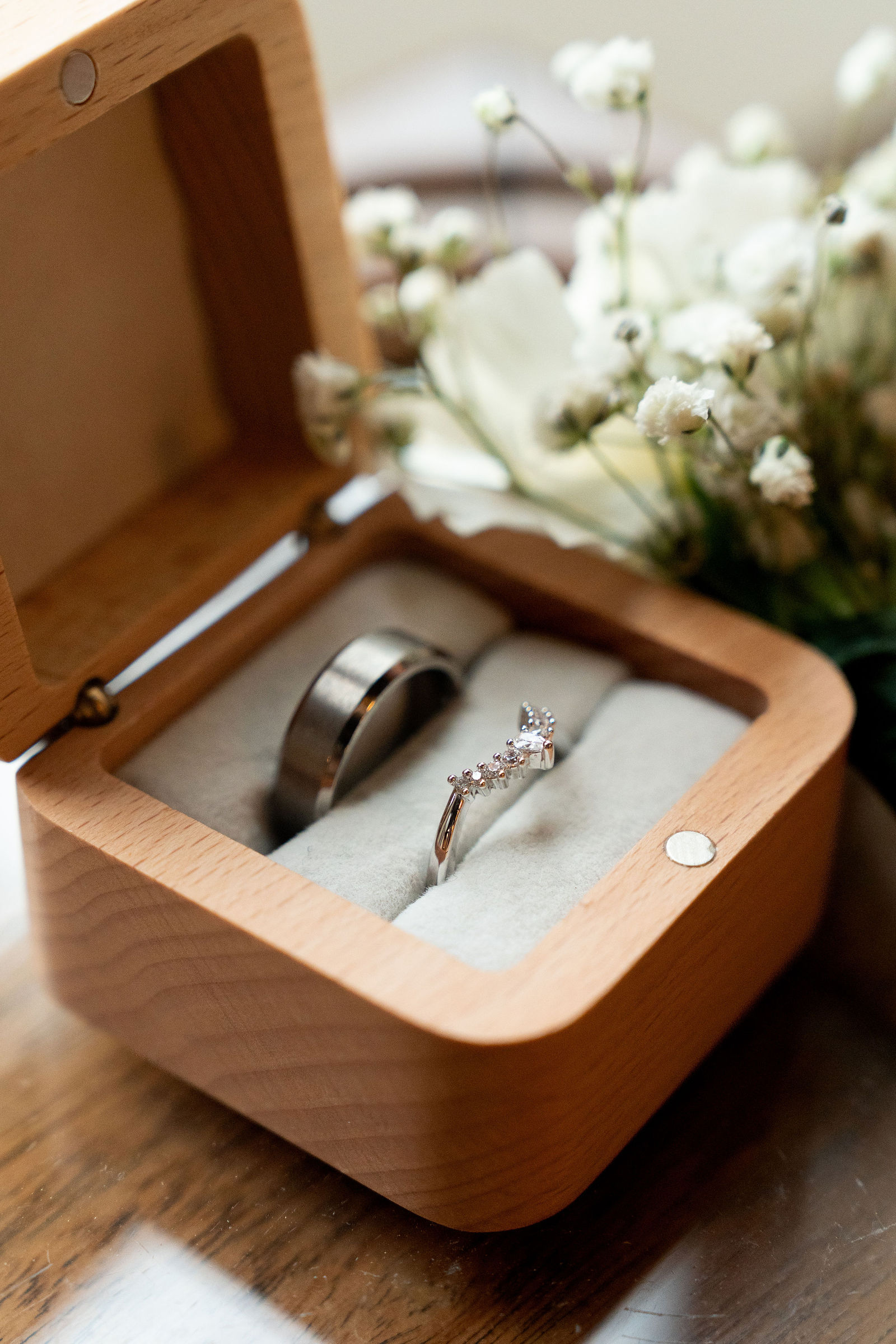 Rings nestled beside baby's breath