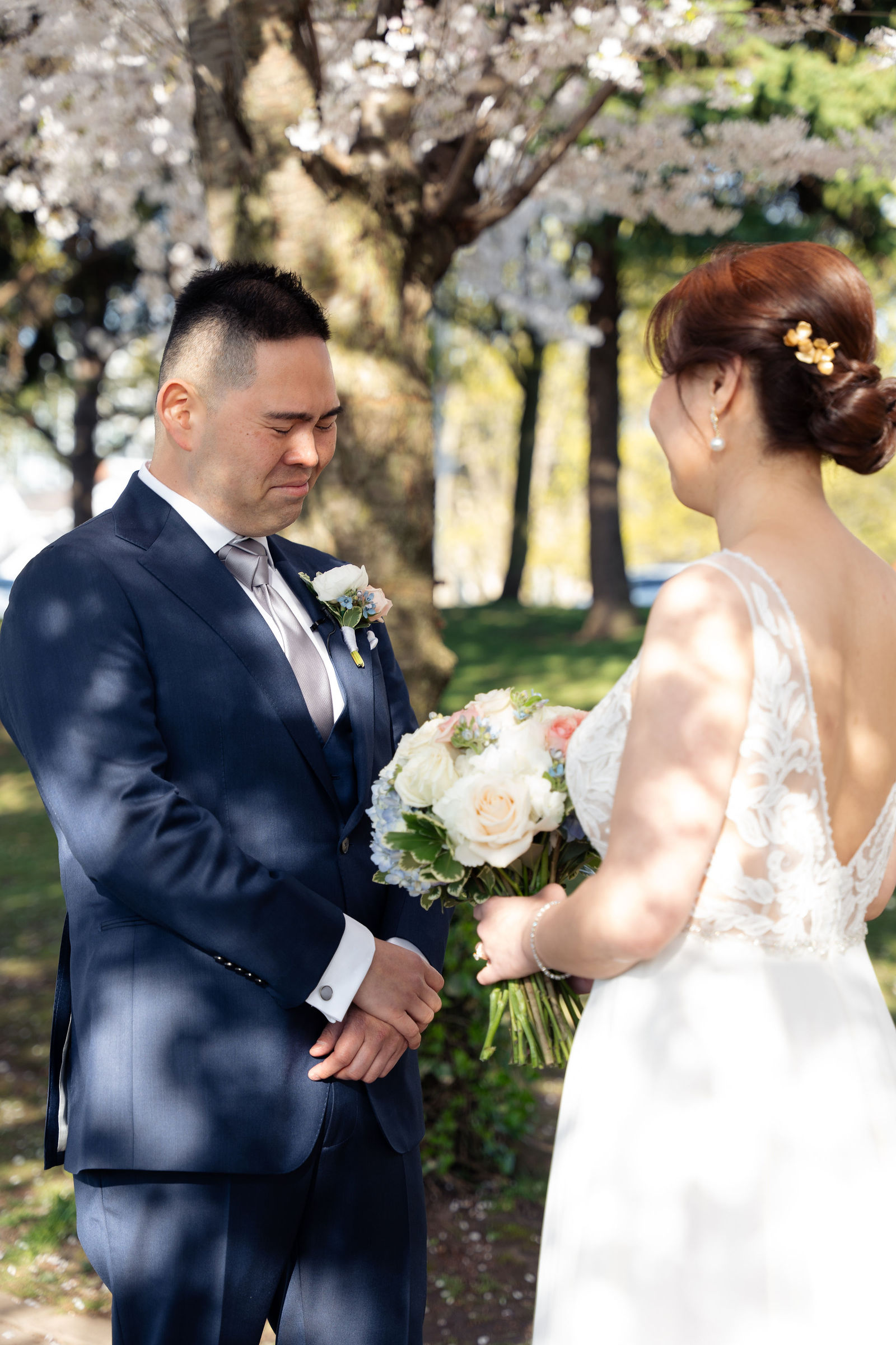 Groom overcome, eyes cast down