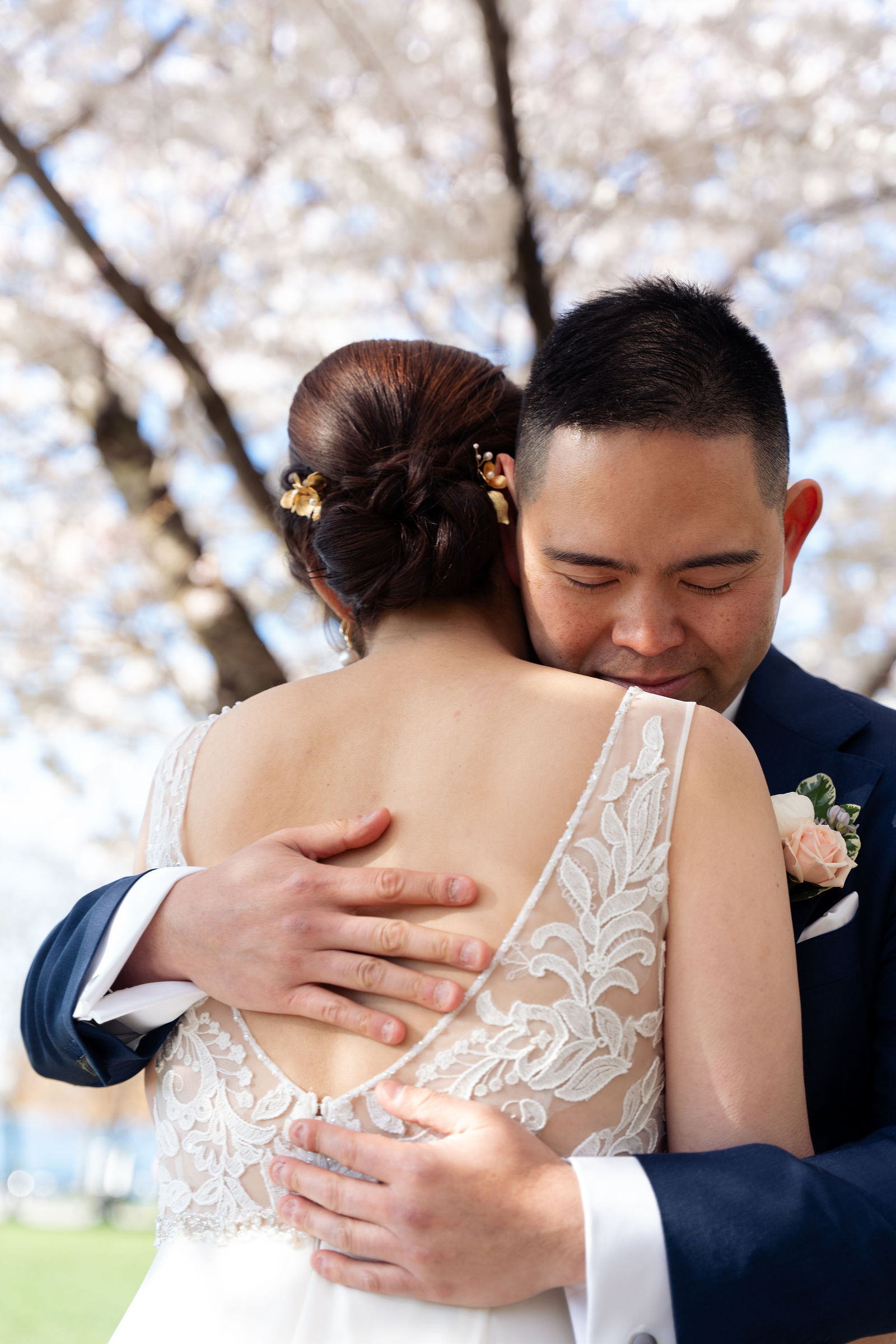 First embrace, hand on lace back