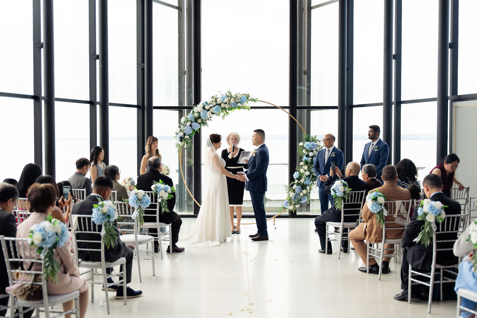 Wide vows under circular arch, lake beyond