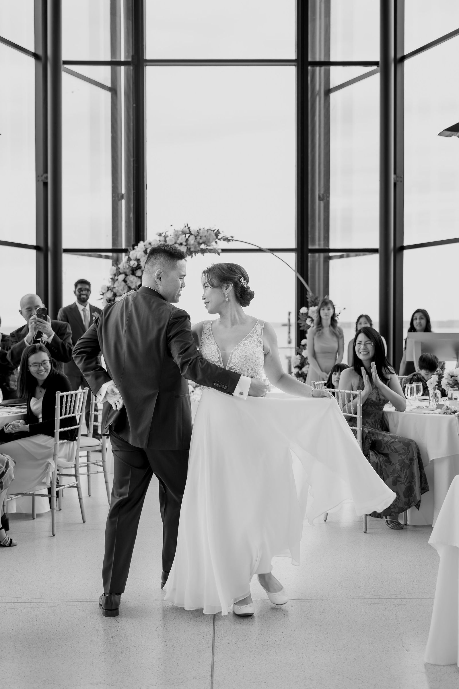 First dance, gown twirling, black and white