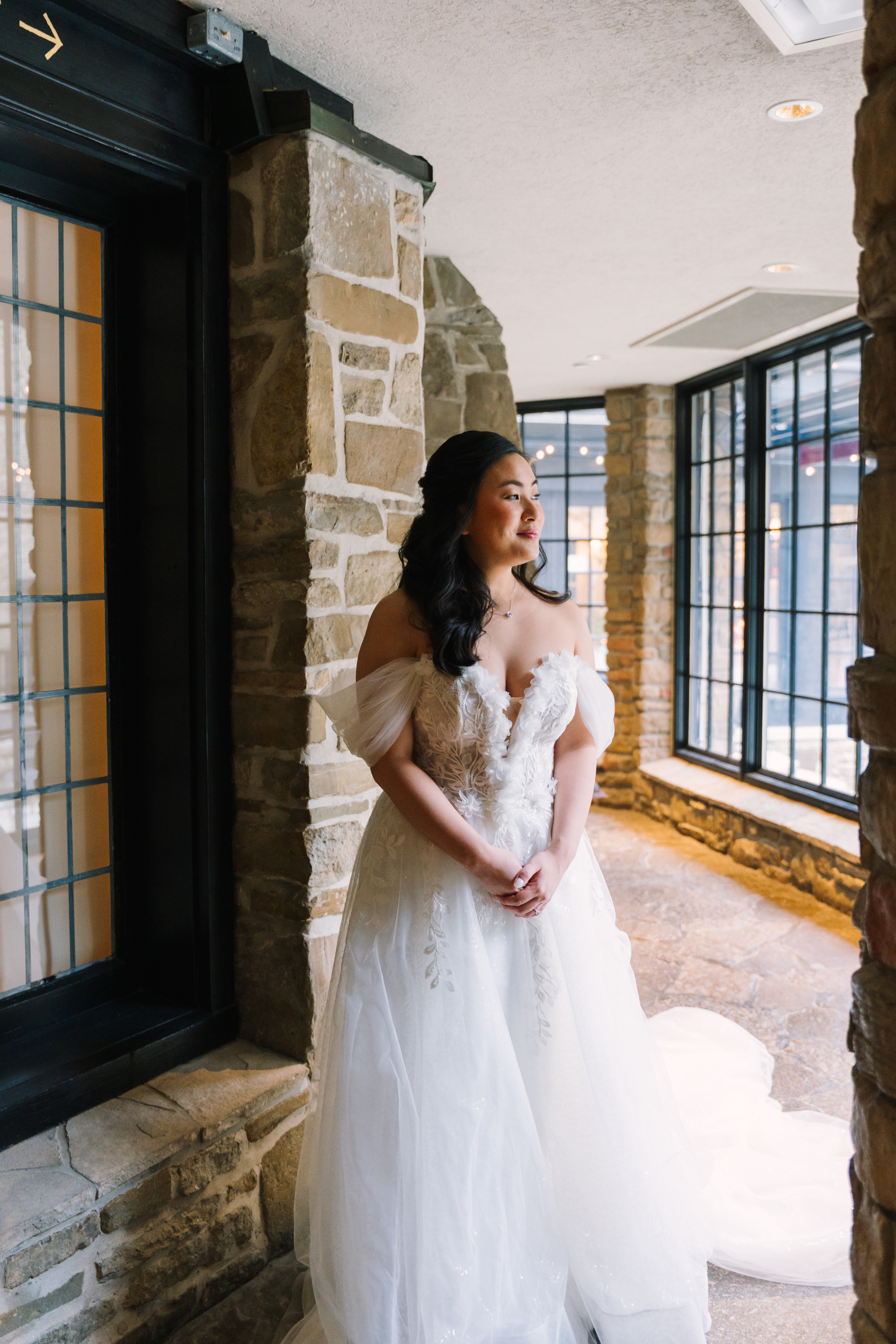 Bridal portrait in stone window light