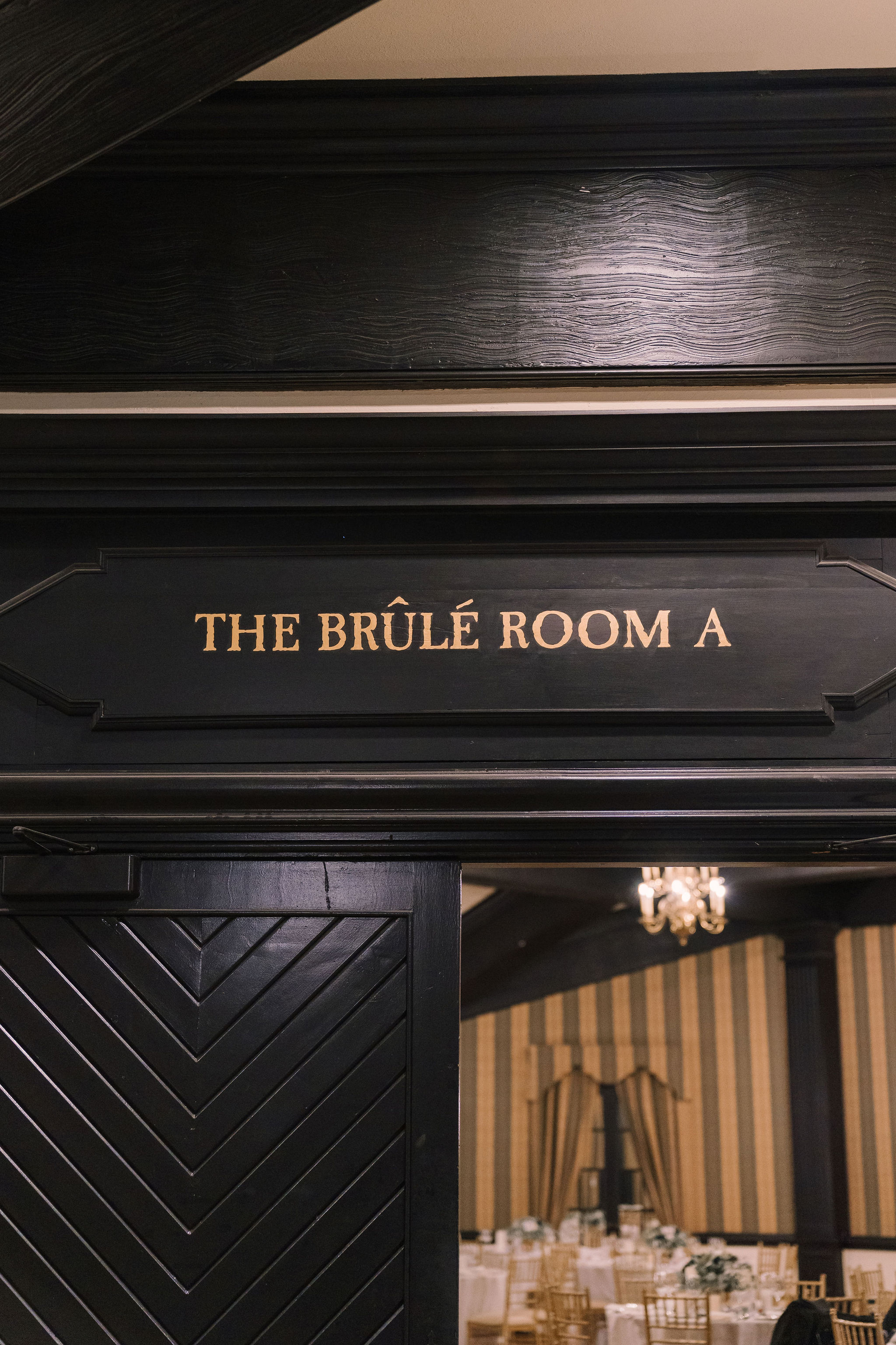The Brûlé Room sign