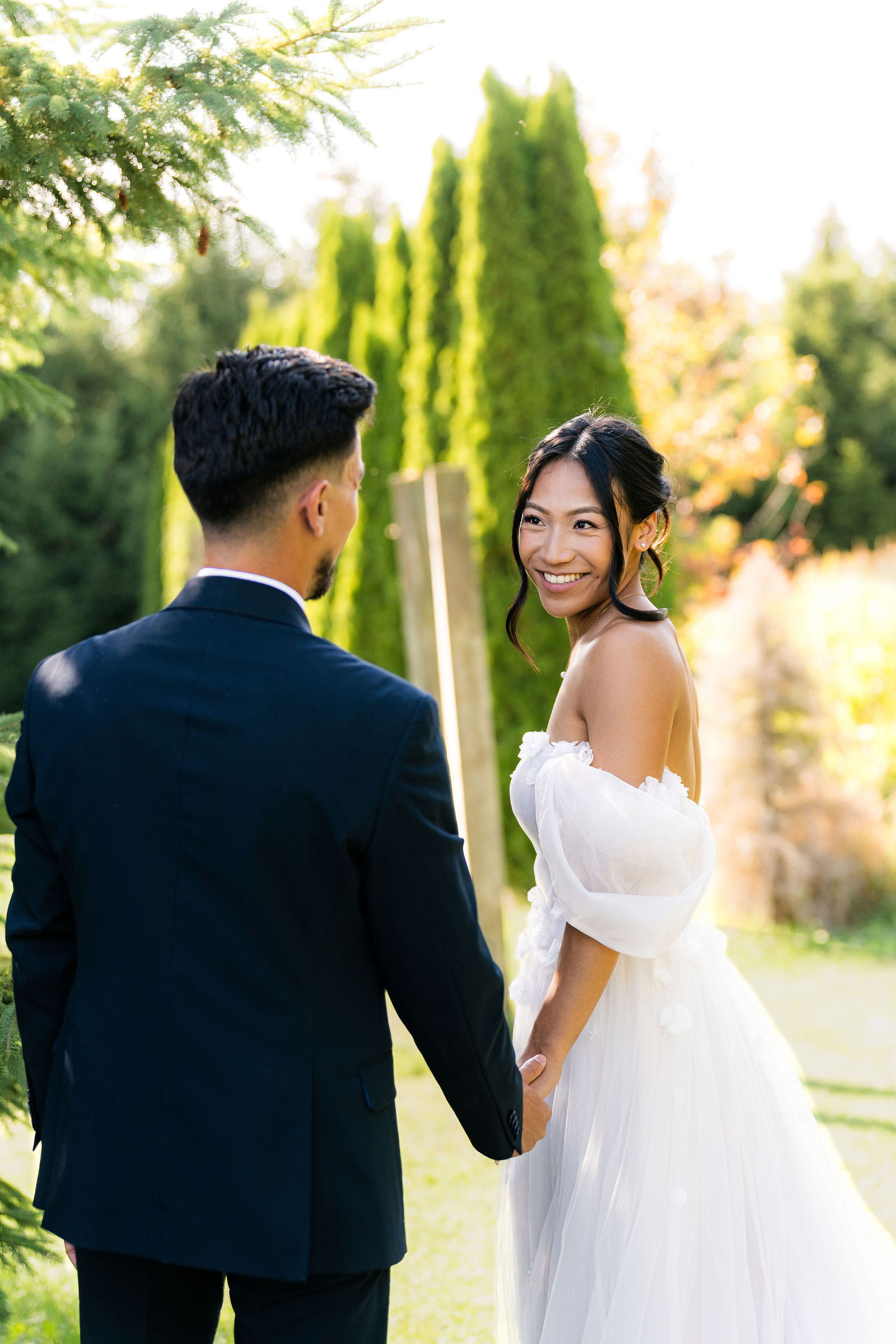 A sweeping dip kiss in the woods
