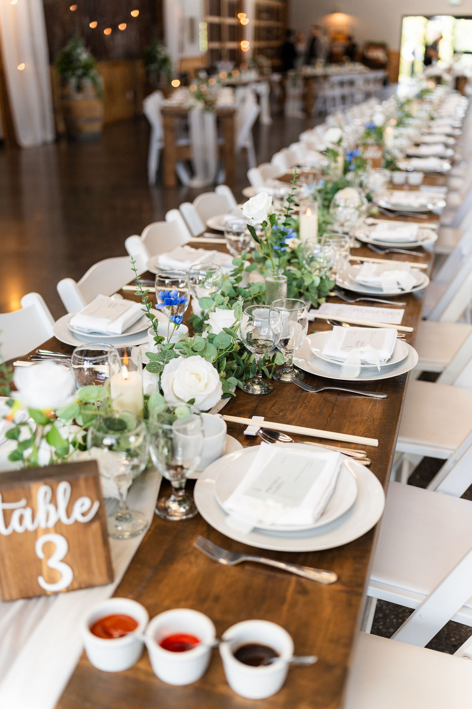 Long table dressed in white roses