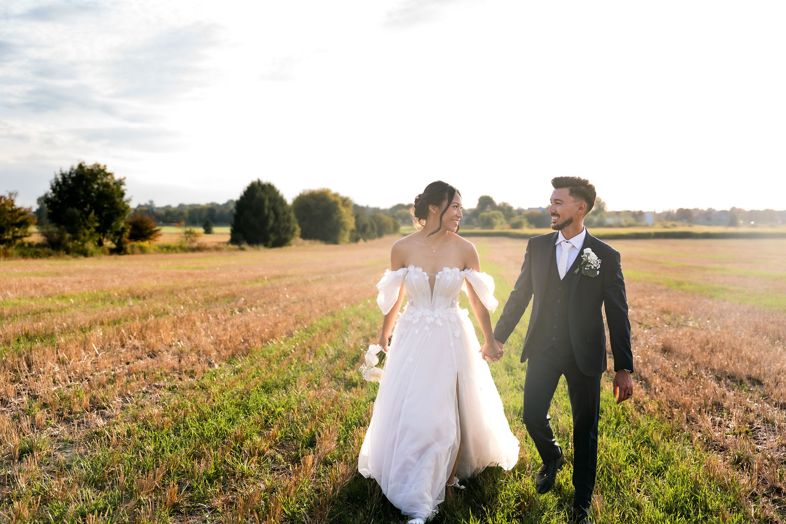 Hand in hand through warm grass